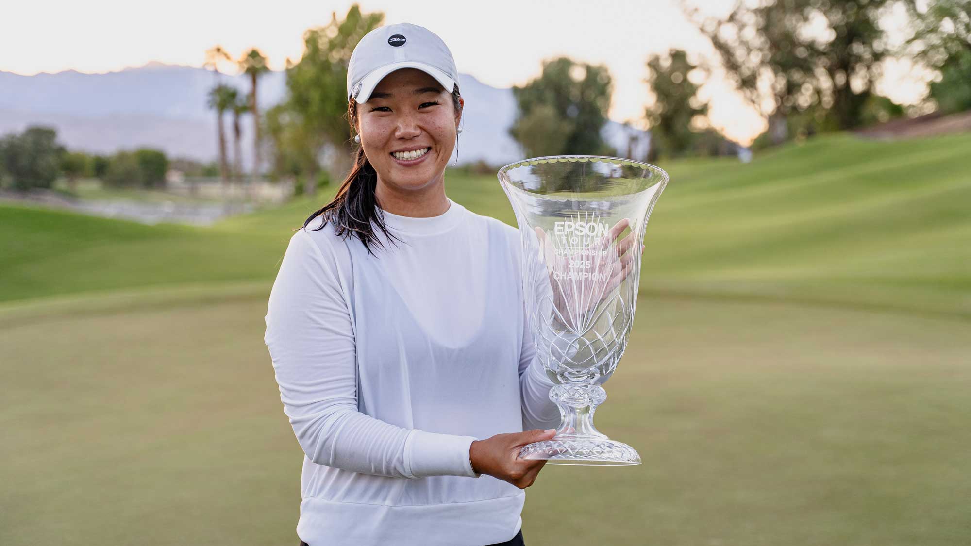 Anne Chen poses with the trophy after winning the 2025 Epson Tour Championship at Indian Wells.