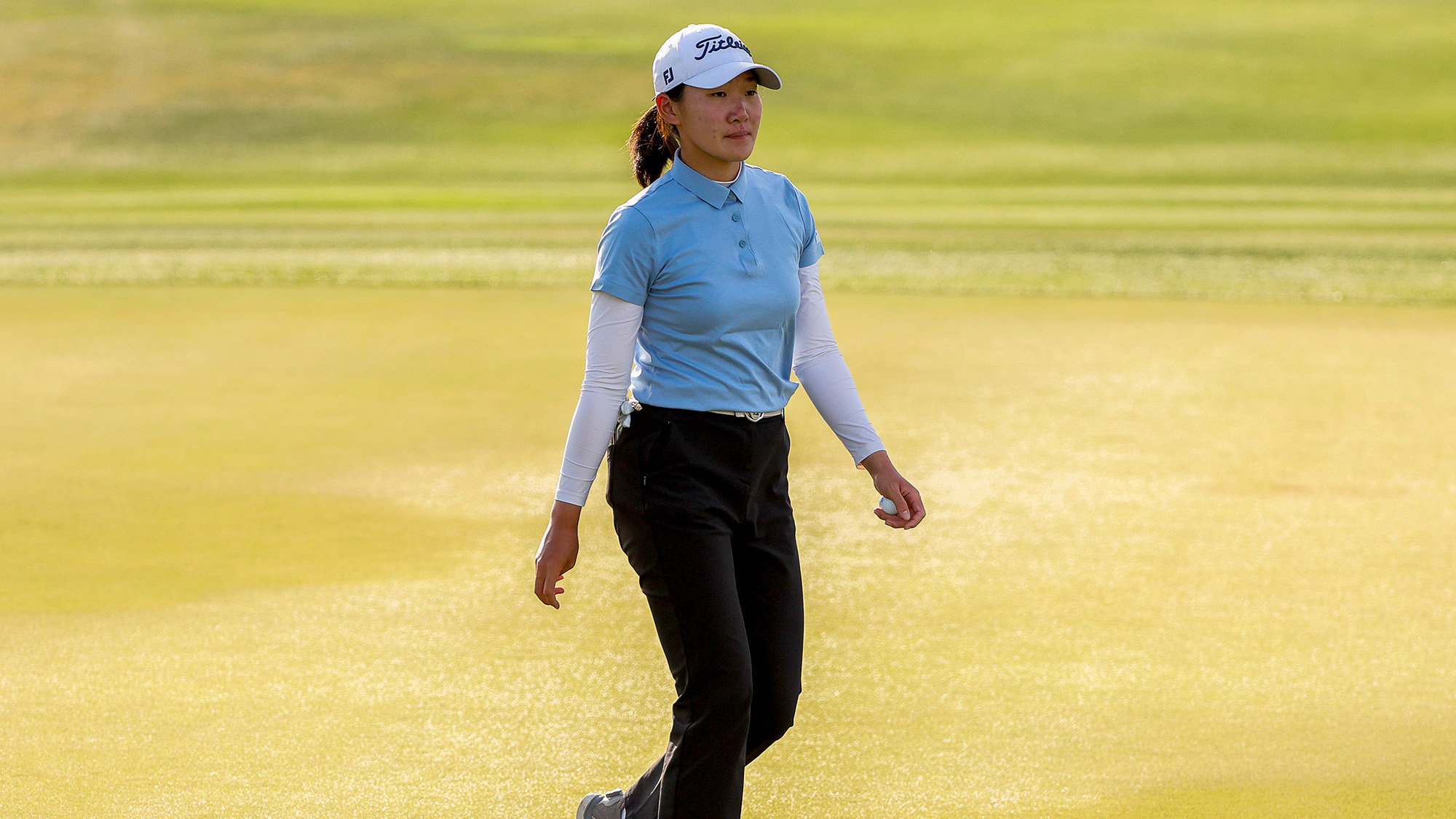 Yahui Zhang of China walks off the 13th hole green during the second round of the Ford Championship presented by Wild Horse Pass 2025 at Whirlwind Golf Club in Wild Horse Pass on March 28, 2025 in Phoenix, Arizona.